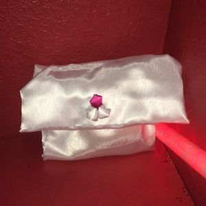 Pearl silk makeup clutch by Doodlez